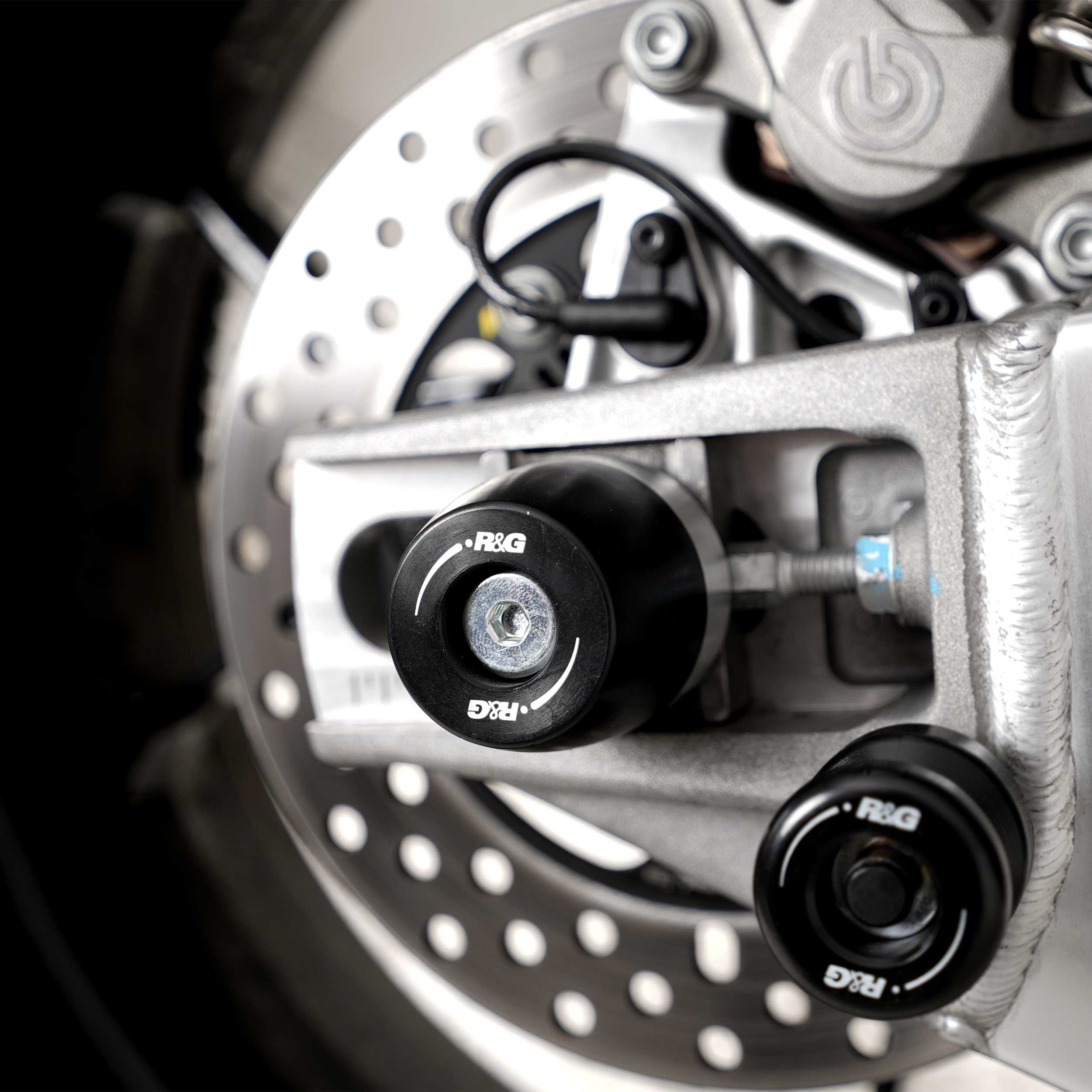 R&G Apex Swingarm Protectors for Aprilia Tuono 1100 Factory (25-26)